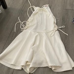 White romper with tie ups